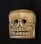 Carved bone skull